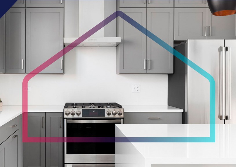 Modern kitchen with gas range and stainless appliances